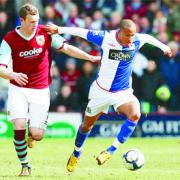 SWEDE DREAMS: Martin Olsson takes on Burnley’s Kevin McDonald