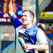 NUMBER ONE: David Dunn salutes the travelling Blackburn supporters