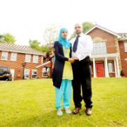 NOISE ROW: Zah and Kiran Hussain outside their house in Blackburn