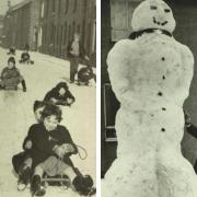 Children play in the snow in the winter 1963 and a young girl is dwarfed by a snowman in Helmshore, January 1963