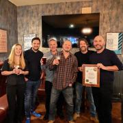 The new batch of brewers at Thwaites, receiving the award from CAMRA, with head brewer Mark O'Sullivan, far right