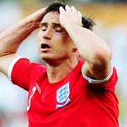 DEFEAT: Frank Lampard and his England team-mates crashed to a 4-1 defeat