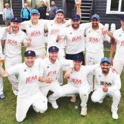 CHEER WE GO: Darwen celebrate after winning their first ever Lancashire League title at the weekend Picture: Harold Heys