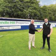 Shaun Astin and Thomas Turner unveiling the stand sponsor