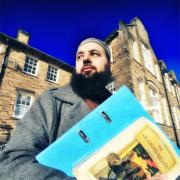 WRITE STUFF Nasrullah Anwar outside his old school in Great Harwood