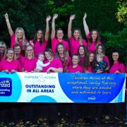 Staff and children from Riverside Nursery celebrating their outstanding Ofsted inspection