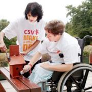 CARING Jasmine joined CSV, whose volunteers are seen helping disabled people