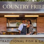 Simon Mathews and his wife, Helen, in their Country Fried mobile fish and chip van