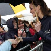 MEET AND GREET Kate Middleton shakes hands with well-wishers following a visit to Darwen Academy