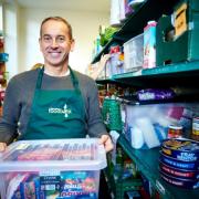 Ribble Valley Foodbank Manager Pete Simm preparing food parcels
