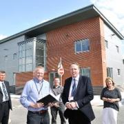 Outside the building are front right, principal Kevin McMahon, with, from left, Frank Nixon, deputy principal, Simon Miles of Cartwright and Gross architects, Andrew Renshaw, project manager for Globe Management and Sarah Flanagan assistant principal.