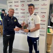 Jordan Britcliffe is handed Saturday’s player of the match award by Ribblesdale Wanderers chair Mark Graham Picture: Ribblesdale Wanderers CC