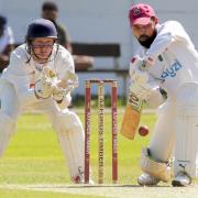Ribblesdale Wanderers wicketkeeper Andrew Needham focused as Farnworth's Yatin Mangwani blocks a delivery Picture: Harry McGuire