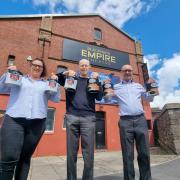 (L-R) Jessica Johnson, value stream manager, Crown Paints, Jamie Haddow, trustee, Blackburn Empire Theatre and Russell Kitchen, operations support manager, Crown Paints