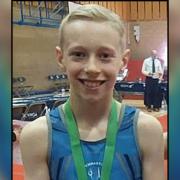 Ted Havers, 11, takes part in national gymnastics competition