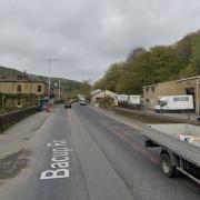 A lane of Bacup Road in Waterfoot, off Holt Mill Road, is closed as emergency services deal with a crash