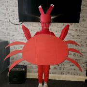 Quinn Clegg, age 6. She is Sebastian the Crab from Little Mermaid