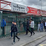 Children arriving at the Wham stadium after taking part in the inaugural Mosque To Match initiative
