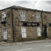 The former Swan pub on Bolton Road in Darwen