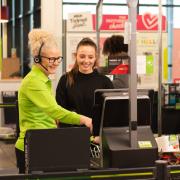 Asda has revealed its underlying earnings swelled by a quarter last year with growth in food and clothing sales.