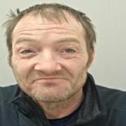 A 49-year-old man has been sentenced for damaging vehicles at a police station.