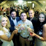 NEW VENTURE Laura Reihl, restaurant owners Adam and Matt Chapman, Danny Fallows and Kate Chapman toast the launch of the refurbished Sirlion Pub in Hoghton.