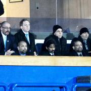 IN ATTENDANCE Balaji Rao, now shorn of his ponytail, and Venkatesh Rao in the front row at Tuesday’s game