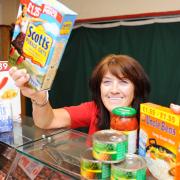 Darwen markets manager Gwen Sangster with some donated food