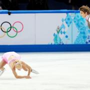 Stacey Kemp falls for the second time in this year’s Games during the short program yesterday