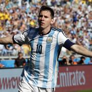 Magic Messi sends Argentina through to knockout stages