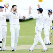 It’s high fives for Padiham’s Duncan Hall (centre) after dismissing Ribblesdale Wanderers Charlie Jackson