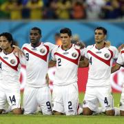 Ten-man Costa Rica beat Greece on penalties
