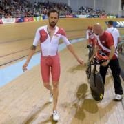England's Sir Bradley Wiggins after losing the Men's 4000m Team Pursuit Gold Medal Race to Australia at the Sir Chris Hoy Velodrome during the 2014 Commonwealth Games in Glasgow.
