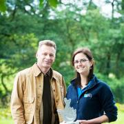 TV’s Chris Packham presents the award to Blanaid Denman of the Skydancer project