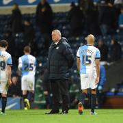 Rovers players cut dejected figures following the late loss to the Owls