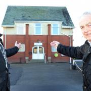 COMPLETED: Brian Cooper, left, of Brian Cooper Builders Ltd, and John Fryer, chairman of trustees, view the new roof