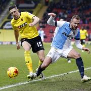 Jordan Rhodes battles for the ball against Watford