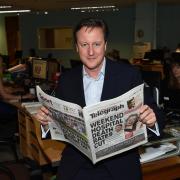 Mr Cameron enjoying the Lancashire Telegraph