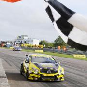 CHEQUERED FLAG: Adam Morgan crosses the line for race victory