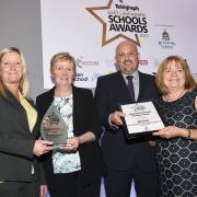 Angela Wilson of Broadfield Specialist School, Oswaldtwistle and former head teacher Angela Banner accept the Special School of the Year Award from North Lancs Training Group’s Gareth Lindsay with Janet Starkie during last year’s awards at Stanley