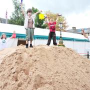 FUN: Lucy Whipp, 10, Finn Cockell, eight, Kai Vellacott , six, and Tom Whipp, 12, all from Barnoldswick, enjoy the annual sand extravaganza