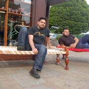 HIT: Imran with nephew Mehraan on the Asian style beds which have proved to be a real hit with customers from Blackburn and beyond