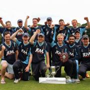 WINNERS ARE GRINNERS: Darwen celebrate their dramatic Readers Cup triumph last night