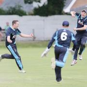 DELIGHT: Darwen celebrate the fall of Leyland’s last wicket as they win the Readers Cup