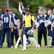OUT: Cherry Tree celebrate the wicket of Settle professional Imran Khalid      Pictures: KIPAX