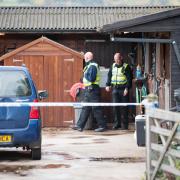 INVESTIGATION: Police officers at the stables in Old Stone Trough Lane, Kelbrook