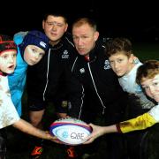 HUDDLE: England World Cup winner Neil Back with Chris Pickles and young Burnley RUFC players		             PHOTOS: Helen Brown