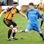 BOUNCE BACK: Clitheroe's Scott Harries in action at Ossett Albion at the weekend