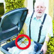 ANGRY: Donald MacKenzie with the teabag (circled) he left in his recycling bin