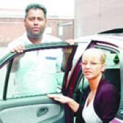 SHAKEN UP: Gail Henderson and taxi driver Shakeel Ahmed